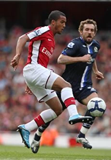 Images Dated 4th October 2009: Theo Walcott (Arsenal) Gael Givet (Blackburn)