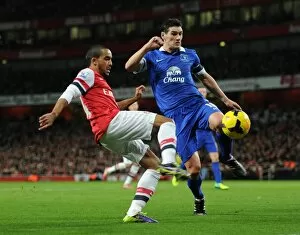 Images Dated 8th December 2013: Theo Walcott (Arsenal) Gareth Barry (Everton). Arsenal 1: 1 Everton. Barclays Premier League