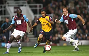 Theo Walcott (Arsenal) Herita Ilunga and James Collins (West Ham)