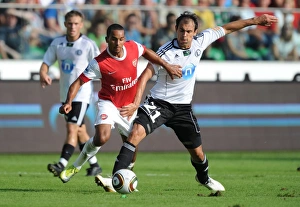 Legia Warsaw v Arsenal 2010-11 Gallery: Theo Walcott (Arsenal) Ivica Vrdoljak (Legia). Legia Warsaw 5: 6 Arsenal