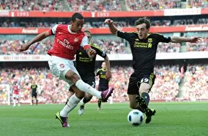 Images Dated 17th April 2011: Theo Walcott (Arsenal) Jack Robinson (Liverpool). Arsenal 1: 1 Liverpool