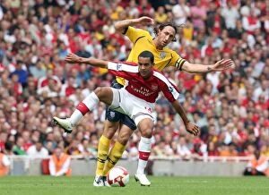 Images Dated 16th August 2008: Theo Walcott (Arsenal) Jonathan Greening (West Brom)