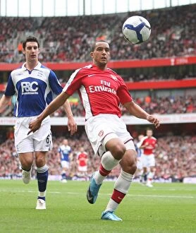 Arsenal v Birmingham City 2009-10 Collection: Theo Walcott (Arsenal) Liam Ridgewell (Birmingham)