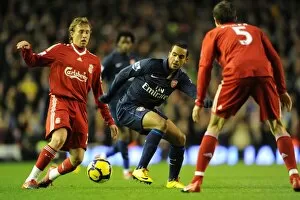 Images Dated 13th December 2009: Theo Walcott (Arsenal) Lucas and Daniel Agger (Liverpool). Liverpool 1: 2 Arsenal