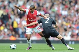 Arsenal v Aston Villa 2010-11 Collection: Theo Walcott (Arsenal) Luke Young (Aston Villa). Arsenal 1: 2 Aston Villa