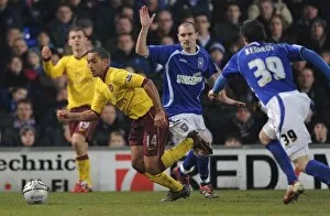 Ipswich Town v Arsenal Carling Cup 2010-11 Collection: Theo Walcott (Arsenal) Mark Kennedy (Ipswich). Ipswich Town 1: 0 Arsenal