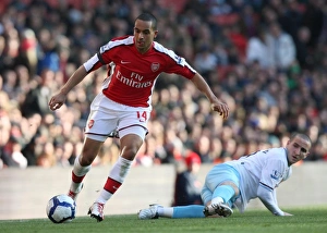Arsenal v Burnley 2009-10 Gallery: Theo Walcott (Arsenal) Martin Paterson (Burnley). Arsenal 3: 1 Burnley. Barclays Premier League