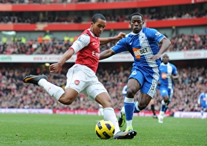 Arsenal V Wigan Athletic 2010-11 Prints: Theo Walcott (Arsenal) Maynor Figueroa (Wigan). Arsenal 3: 0 Wigan Athletic