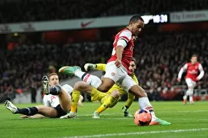 Theo Walcott (Arsenal) Michael Dawson and Hugo Lloris (Tottenham). Arsenal 2: 0 Tottenham Hotspur