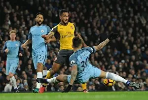 Images Dated 18th December 2016: Theo Walcott (Arsenal) Nicolas Otamendi (Man City)