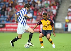 Huddersfield V Arsenal 2008-09 Prints: Theo Walcott (Arsenal) nutmegs Maichael Collins (Huddersfield)