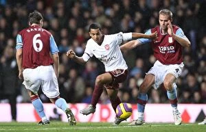 Images Dated 3rd December 2007: Theo Walcott (Arsenal) Olof Mellberg and Gareth Barry (Aston Villa)