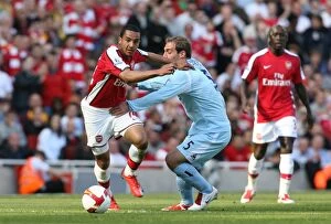 Images Dated 4th April 2009: Theo Walcott (Arsenal) Pablo Zabaleta (Man City)
