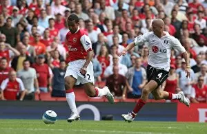 Images Dated 13th August 2007: Theo Walcott (Arsenal) Paul Konchesky (Fulham)