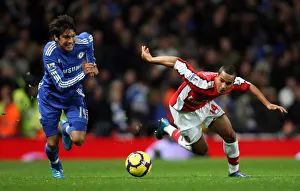 Arsenal v Chelsea 2009-10 Gallery: Theo Walcott (Arsenal) Paulo Ferreira (Chelsea). Arsenal 0: 3 Chelsea. Barclays Premier League