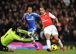 Images Dated 27th December 2010: Theo Walcott (Arsenal) Petr Cech (Chelsea). Arsenal 3: 1 Chelsea. Barclays Premier League