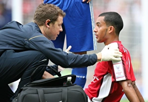 Theo Walcott and Arsenal Physio Colin Lewin