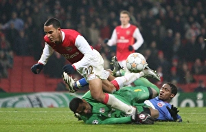 Images Dated 12th December 2007: Theo Walcott (Arsenal) Robinson Zapata (Bucuresti)