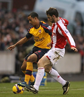Stoke City V Arsenal 2008-09 Prints: Theo Walcott (Arsenal) Rory Delap (Stoke)