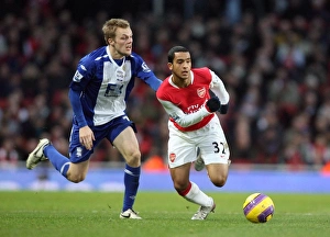 Images Dated 12th January 2008: Theo Walcott (Arsenal) Seb Larsson (Birmingham)