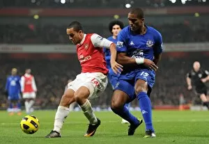 Theo Walcott (Arsenal) Sylvain Distin (Everton). Arsenal 2: 1 Everton. Barclays Premier League