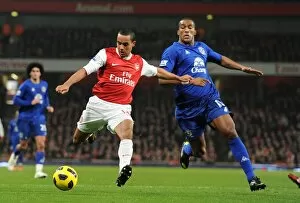 Theo Walcott (Arsenal) Sylvian Distin (Everton). Arsenal 2: 1 Everton, Barclays Premier League