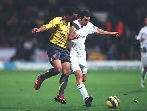 Images Dated 27th November 2006: Theo Walcott (Arsenal) Tal Ben Haim (Bolton)