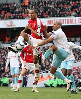 Arsenal v Burnley 2009-10 Gallery: Theo Walcott (Arsenal) Tyrone Mears (Burnley). Arsenal 3: 1 Burnley. Barclays Premier League