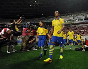 Uwara Red Diamonds V Arsenal 2013-14 Prints: Theo Walcott (Arsenal). Uwara Red Diamonds 1: 2 Arsenal. Pre Season Friendly. Pre