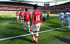 Walcott Theo Collection: Theo Walcott (Arsenal) walks out onto the pitch