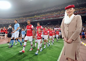 Theo Walcott (Arsenal) walks out to the pitch. Arsenal 0:2 Manchester City Theo Walcott (Arsenal) walks out to the pitch. Arsenal 0:2 Manchester City