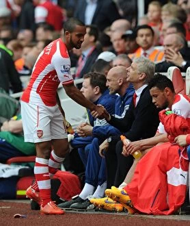 Arsenal v West Bromwich Albion 2014/15 Collection: Theo Walcott Bids Farewell to Wenger: Arsenal's Emotional Last Match under Arsene Wenger against