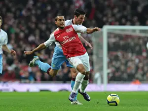 Arsenal V Aston Villa - FA Cup 2011-12 Prints: Theo Walcott Breaks Past Aston Villa's Ciaran Clark in FA Cup Fourth Round Clash at Arsenal's Emirates Stadium