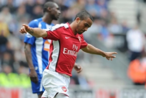 Images Dated 18th April 2010: Theo Walcott celebrates scoring the 1st Arsenal goal. Wigan Athletic 3: 2 Arsenal