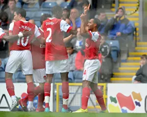Theo Walcott celebrates scoring the 1st Arsenal goal with Abou Diaby, Cesc Fabregas