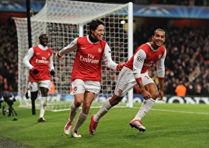 Arsenal v Partizan Belgrade 2010-11 Collection: Theo Walcott celebrates scoring the 2nd Arsenal goal with Samir Nasri. Arsenal 3