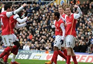 Images Dated 24th February 2008: Theo Walcott celebrates scoring the 2nd Arsenal goal with Alex Hleb