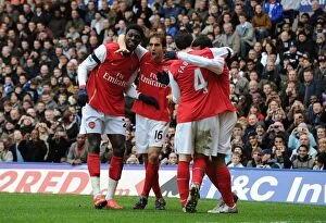 Images Dated 24th February 2008: Theo Walcott celebrates scoring the 2nd Arsenal goal with Mathieu Flamini