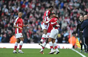 Arsenal V Burnley 2009-10 Prints: Theo Walcott celebrates scoring the 2nd Arsenal goal with Emmanuel Eboue