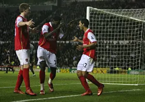 Theo Walcott celebrates scoring the 4th Arsenal goal with Emmanuel Adebayor
