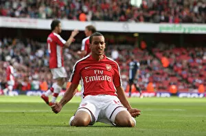 Images Dated 4th October 2009: Theo Walcott celebrates scoring the 5th Arsenal goal
