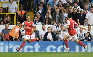 Images Dated 20th April 2011: Theo Walcott celebrates scoring Arsenals 1st goal. Tottenham Hotspur 3: 3 Arsenal