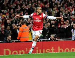 Images Dated 29th December 2012: Theo Walcott celebrates scoring Arsenals 1st goal. Arsenal 7: 3 Newcastle United