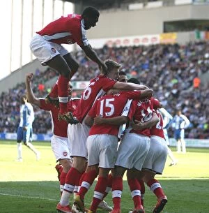 Images Dated 11th April 2009: Theo Walcott celebrates scoring Arsenals 1st goal