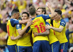 Arsenal V Aston Villa - FA Cup Final 2015 Prints: Theo Walcott celebrates scoring Arsenals 1st goal with his team mates