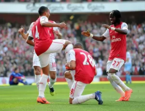 Arsenal V Aston Villa - 2011-12 Prints: Theo Walcott celebrates scoring Arsenals 2nd goal with Kieran Gibbs and Gervinho