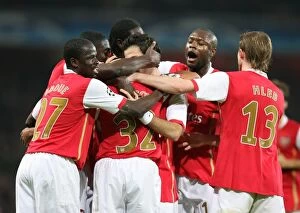 Images Dated 24th October 2007: Theo Walcott celebrates scoring Arsenals 3rd goal with his team mates