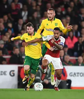 Arsenal V Norwich - Carabo Cup 4th Round 2017-18 Prints: Theo Walcott Clashes with Norwich's James Husband