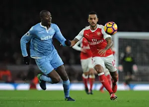 Arsenal V Stoke City 2016-17 Prints: Theo Walcott Closes Down Giannelli Imbula in Intense Arsenal v Stoke City Premier League Clash