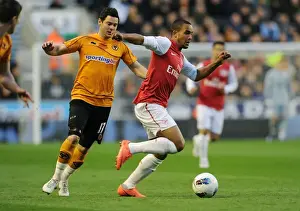 Wolverhampton Wanderers V Arsenal 2011-12 Prints: Theo Walcott Dashes Past Matt Jarvis: Wolverhampton Wanderers vs